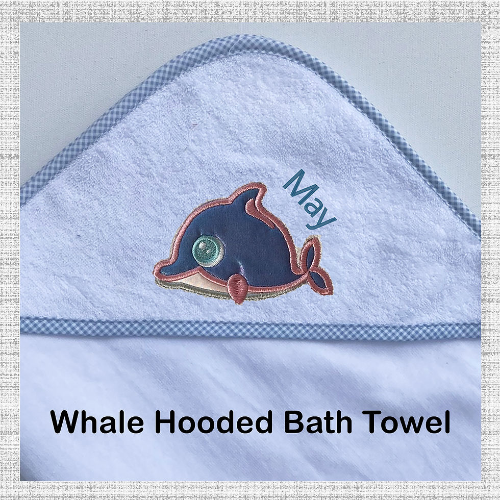 Image of close up embroidered hooded bath towel by Tailor and Blake Embroidery